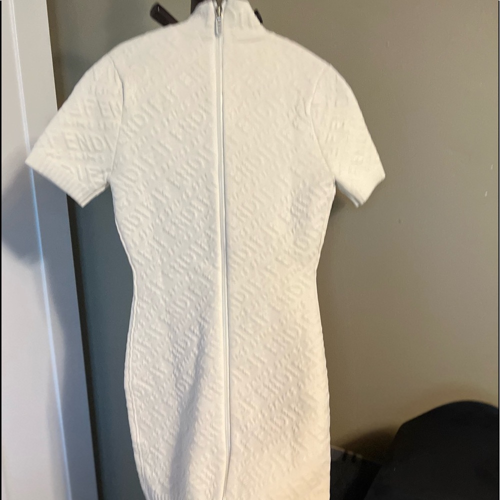 White hugging dress